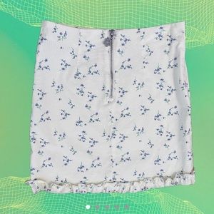 Floral mini skirt with frilly hem